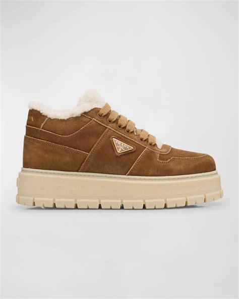 prada leather shearling platform.